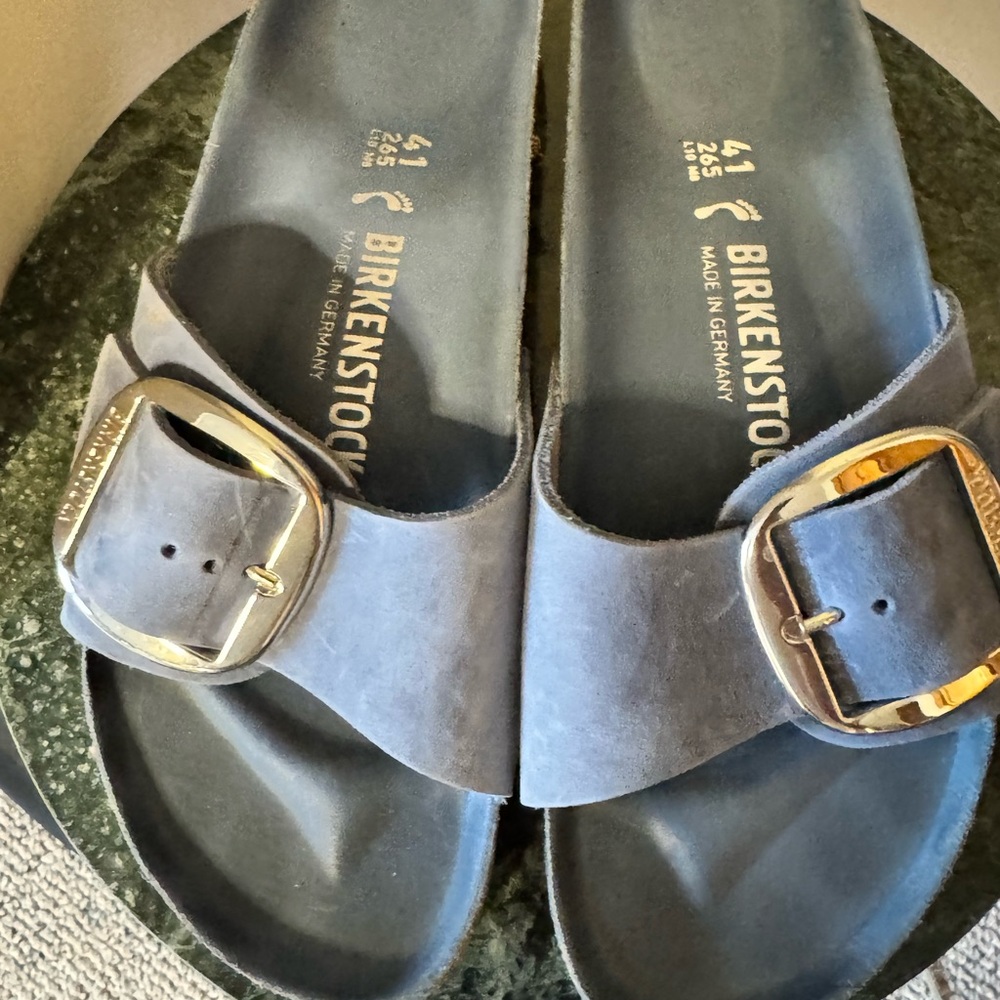 Suede powder blue Birkenstock sandals.